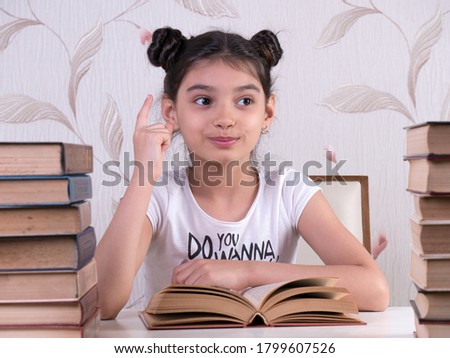 schoolgirl read book, young girl bored and tired of reading book at home. bored focused brainy girl nerd reading book learning grammar preparing final year exam test  tired of studying