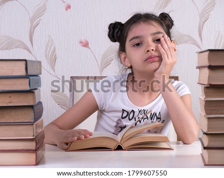 schoolgirl read book, young girl bored and tired of reading book at home. bored focused brainy girl nerd reading book learning grammar preparing final year exam test . tired 