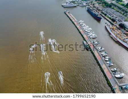 Aerial view of the Delaware river with boardwalk along the in the beautiful marina in boats piers