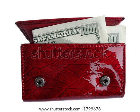 Red wallet with one hundred dollar bill sticking out and isolated on a white background