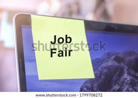 top view of words note on laptop computer screen with Job fair text
