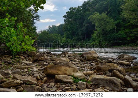 Rocky River Bank On Mulberry River in Oark, Arkansas Royalty-Free Stock Photo #1799717272