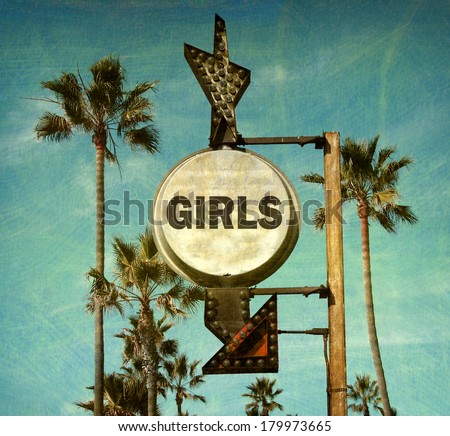 aged and worn vintage photo of girls sign at beach                               
