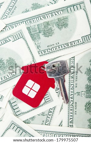 House keys over the hundred dollar banknotes 