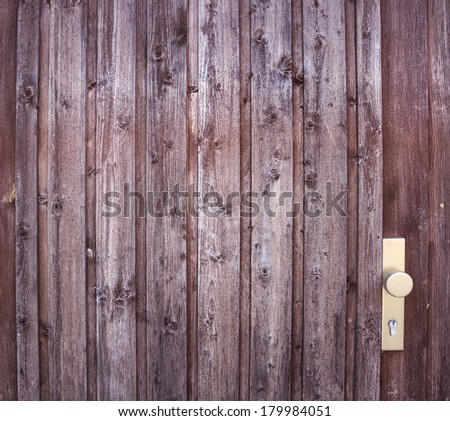old dark brown wooden door texture, background 