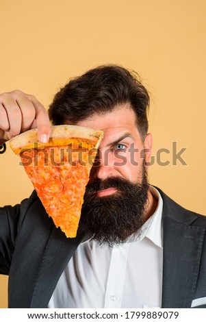 Pizza Margarita. Bearded man hold slice of pizza. Fastfood. Bearded man eating pizza. Man eat pizza slice. Delicious fast food. Italian cuisine.