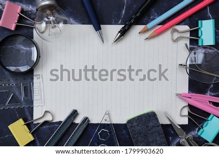 Back to school. Items for the school on white background a  white paper space for text