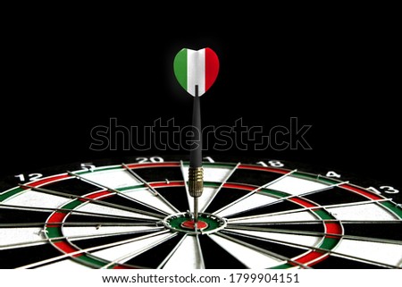 The flag of Italy is featured on the dart board game, the concept of achieving goals.