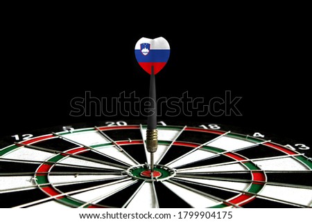 The flag of Slovenia is featured on the dart board game, the concept of achieving goals.