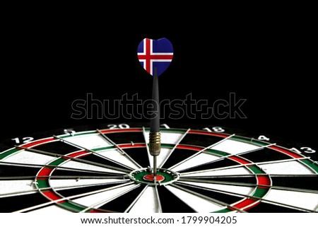 The flag of Iceland is featured on the dart board game, the concept of achieving goals.