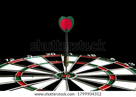 The flag of Bangladesh is featured on the dart board game, the concept of achieving goals.