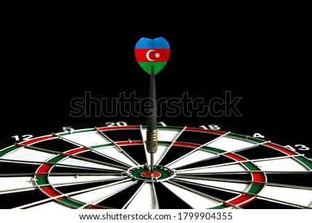 The flag of Azerbaijan is featured on the dart board game, the concept of achieving goals.