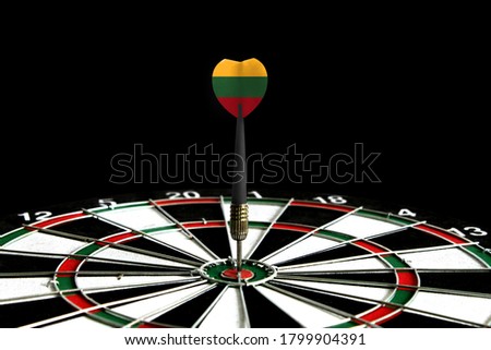 The flag of Lithuania is featured on the dart board game, the concept of achieving goals.