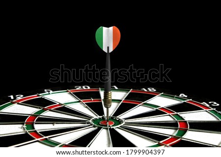 The flag of Ireland is featured on the dart board game, the concept of achieving goals.