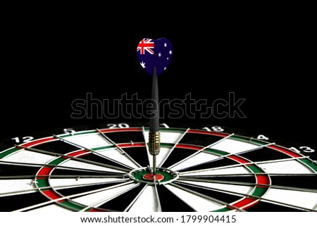 The flag of Australia is featured on the dart board game, the concept of achieving goals.