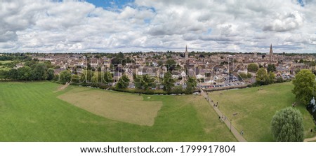 An aerial photograph of the picturesque town of Stamford, Lincolnshire, UK. Taken from the town meadows and showing various church spires.