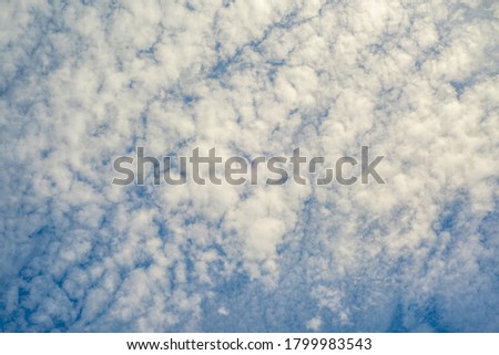 High-quality photographic image. Background image of the sky and white clouds.