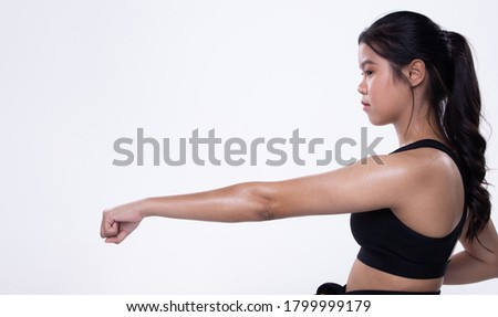 Sport Athlete Teenager Girl sweat tired on arms shoulder after heavy exercise, weight loss concept, studio lighting white background isolated