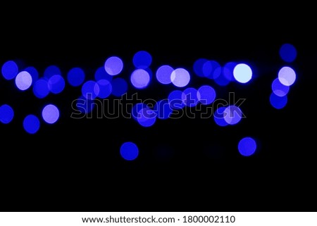Bokeh blue and white colors. Colored round lights