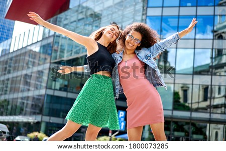 Image of two young happy women having fun, smiling, lovely moments, best friends