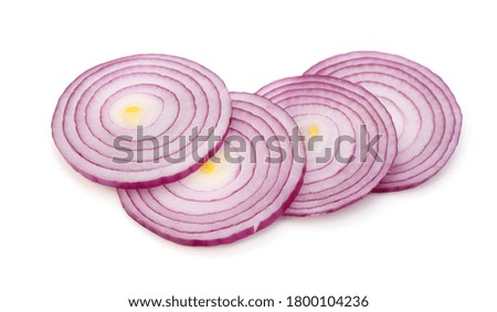Red onion rings on white background 
