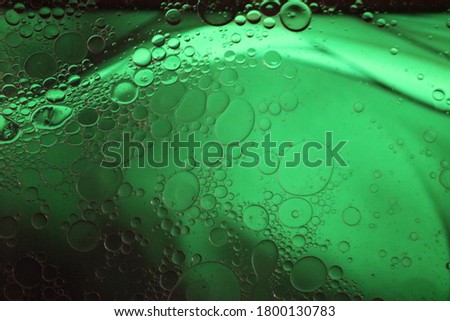 Watet droplets mixed with oils abstract photo