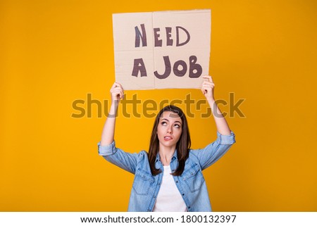 Need a job. Photo of pretty loser business lady carton placard above head jobless poor money asking help support assistance wear casual denim shirt isolated bright yellow color background