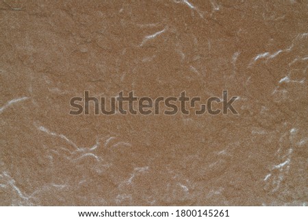 Background of brown wall tiles texture. Close up image. Outdoor home decoration.