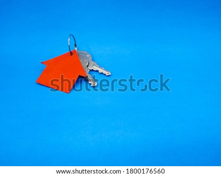 House Key with blue Background Stock Photos, Pictures & Royalty Free Images
