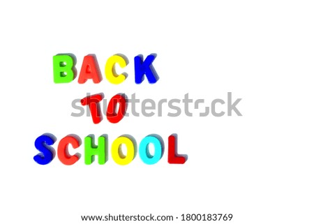 bright letters laid out back to school on a white background