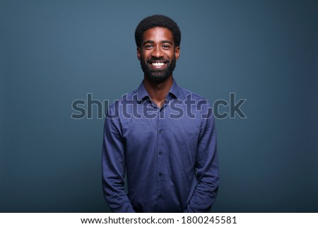 Beautiful black man in front of a background