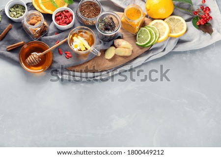 Alternative medicine, natural homemade remedy for cold and flu on gray background. Immunity boosting. Top view, copy space
