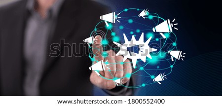 Man touching a network communication concept on a touch screen with his finger
