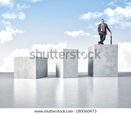3d image of huge concrete block and smiling man
