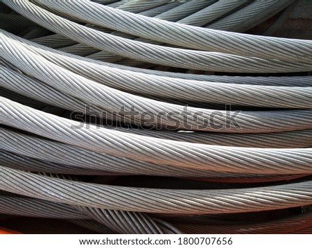 Picture of the wire rope used in the application of electricity, close up of rusty metal wire rope background. mooring rope made from steel.