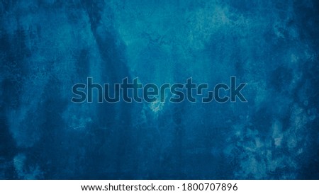 abstract decorative dark background, grunge navy blue stucco wall background. 