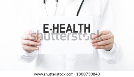 Doctor holding a card with E-Health medical concept