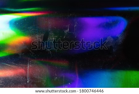 Abstract background of holographic strings of all rainbow colors. Royalty-Free Stock Photo #1800746446