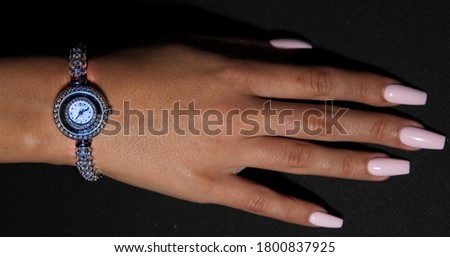 Lady’s hand manicured wearing nice jewellery