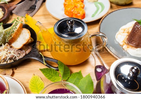 autumn tea on with yellow leaves
