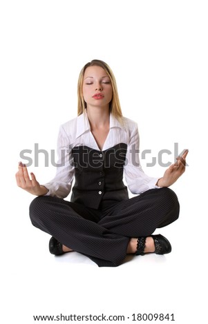 Business woman sitting in a lotus position with his eyes closed
