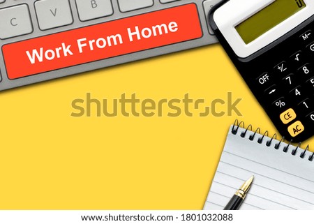 WORK FROM HOME text with fountain pen, calculator, keyboard and notepad on yellow background. Business, Healthcare and Copy space concept 