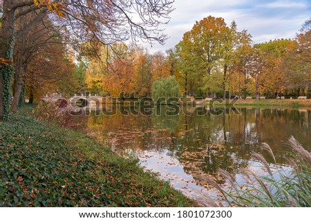 Colorful autumn view of Royal Baths Park in Warsaw
