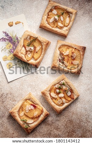 Tiny puff pastry nectarine tarts, top view