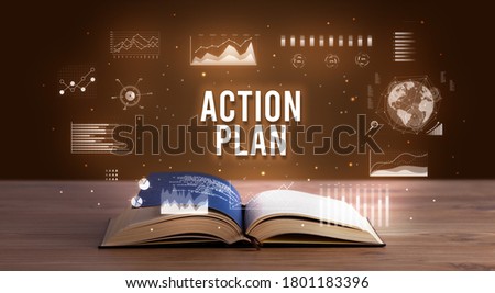 ACTION PLAN inscription coming out from an open book, creative business concept