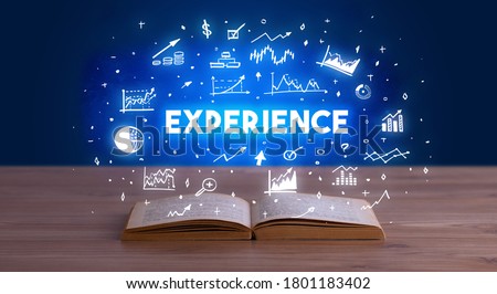 EXPERIENCE inscription coming out from an open book, business concept