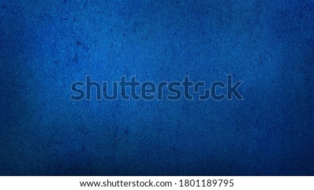grunge dark blue gradient stucco wall background. abstract grainy blue wall background with space for text. Royalty-Free Stock Photo #1801189795