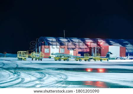 Airport at night in winter. Pictures at the airport
