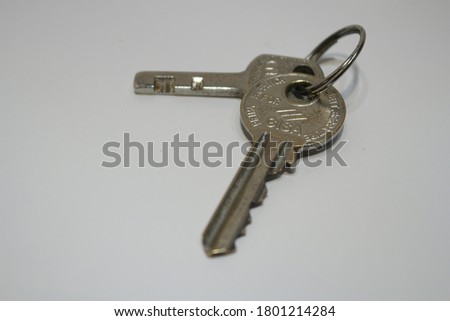 Doors keys isolated on white background. Two keys on metal keyring isolated on white background. photo without editing.