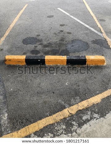 High angle view of traffic sign at parking lot